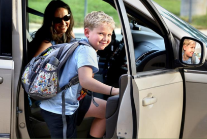  student leaving car on first day of school