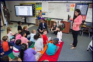 Atif Quarni sits in on classroom 