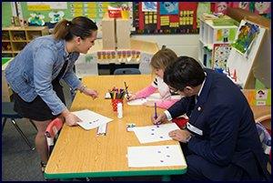 Secretry of Education Atif Quarni participates in schoolwork 